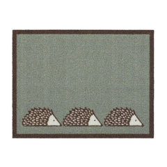 Spike Green Outdoor Doormat. Made from ECONYL regenerated yarn featuring three hedgehogs.