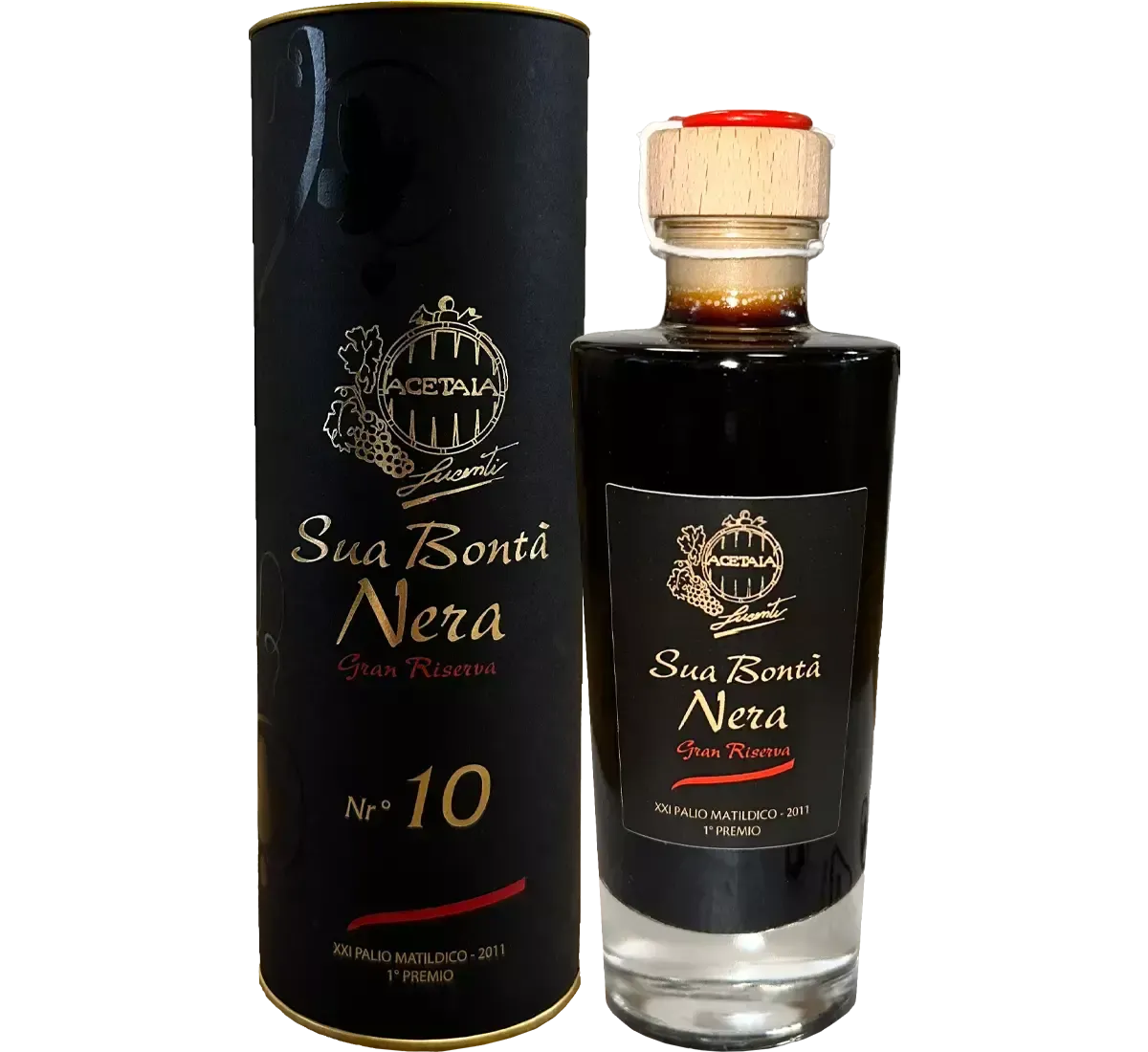 A bottle of Sua Bontà Nera Gran Riserva, an elegant balsamic condiment, looks refined next to its packaging.
