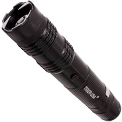 A black Tiger-USA Xtreme SHOCKDROP Stun Gun Flashlight 100M. The flashlight is compact and cylindrical with a ribbed grip and a small LED light at the end.